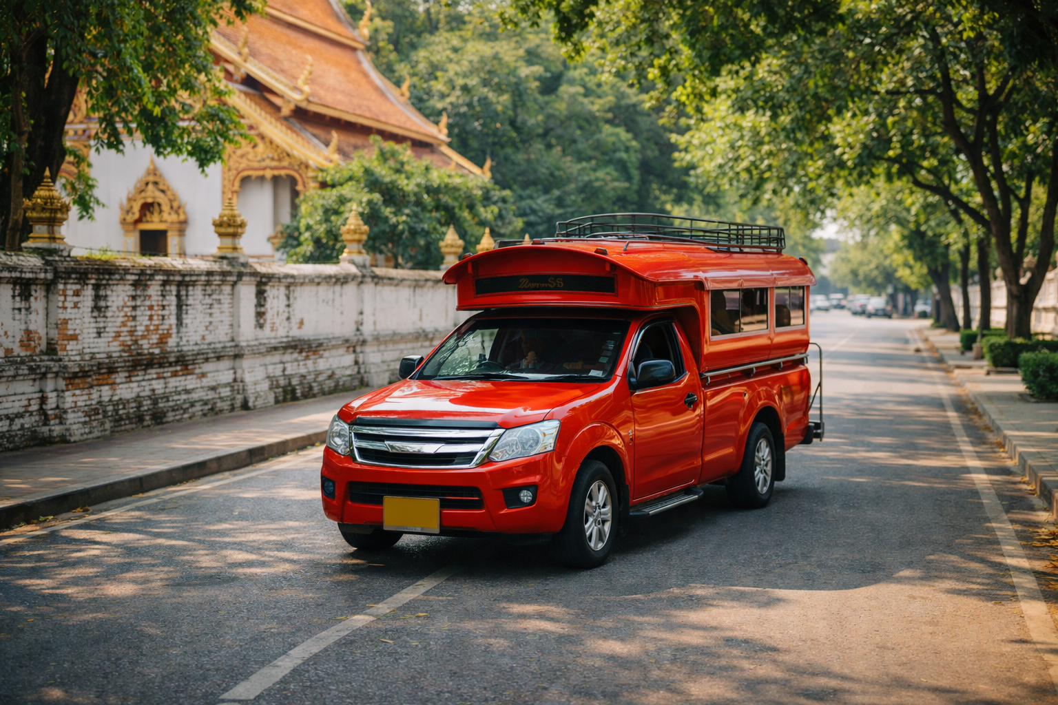 Red songthaew in Old City street